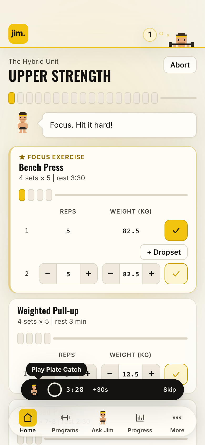 Workout view in jim.: set logged, rest timer and Plate Catch bubble
